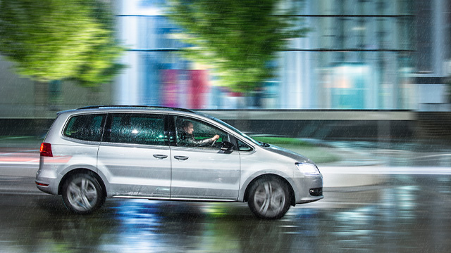 a car driving in rain
