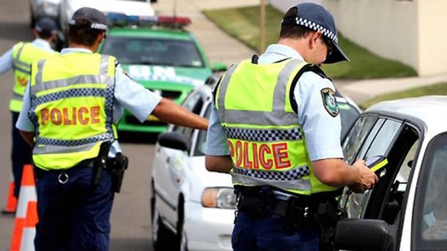Police officers pulling drivers over for breath-testing