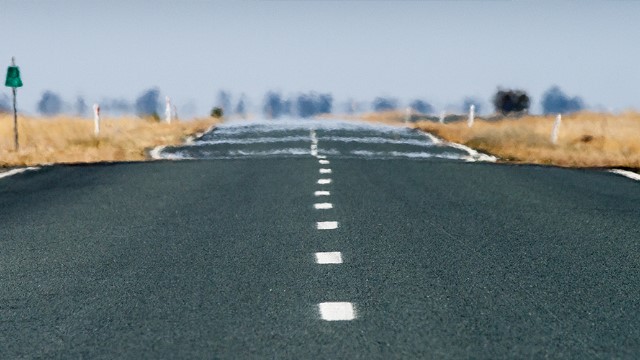 Haze shimmering over a hot country road
