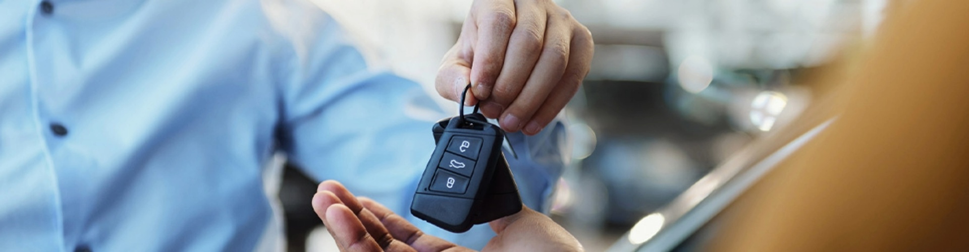 Man handing over keys