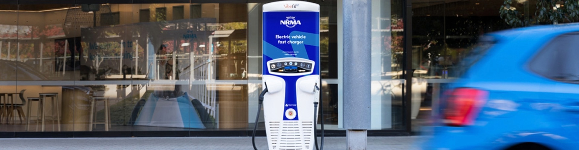 An EV fast-charger on a city street