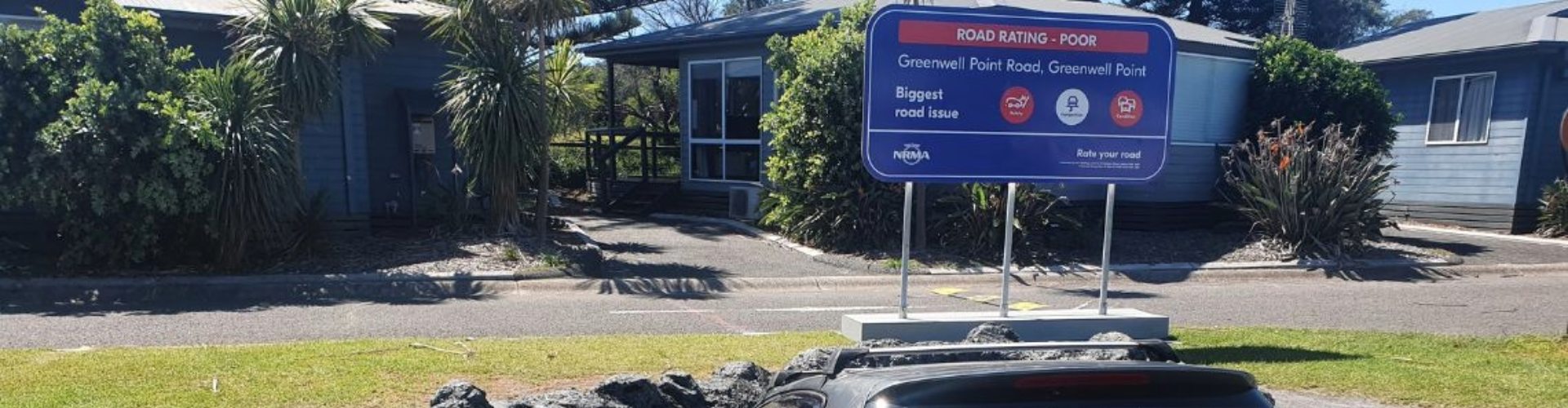 What appears to be a car sinking into a pothole