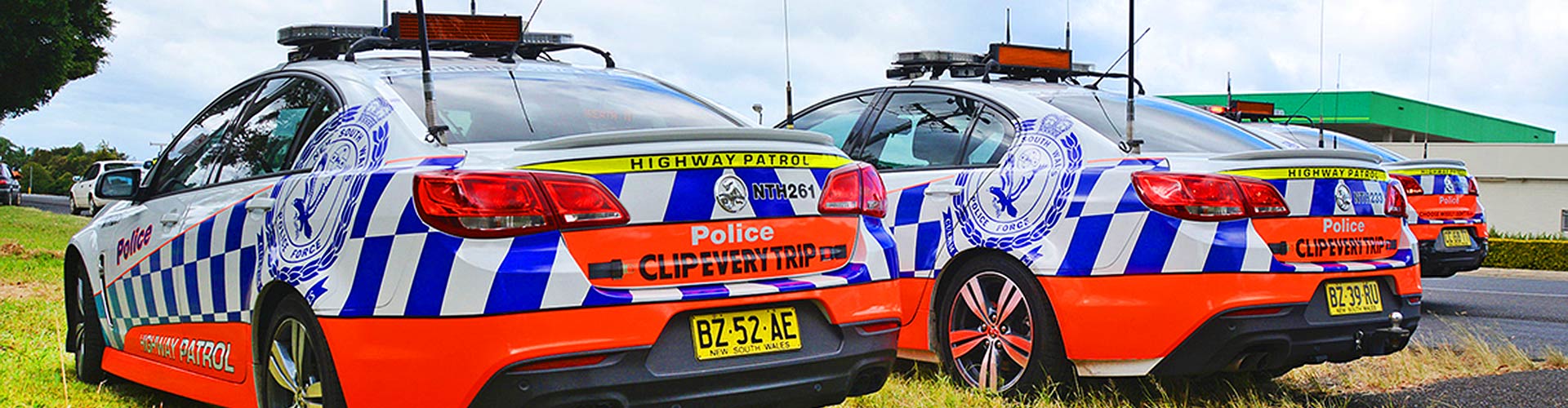 Police cars on the side of the road