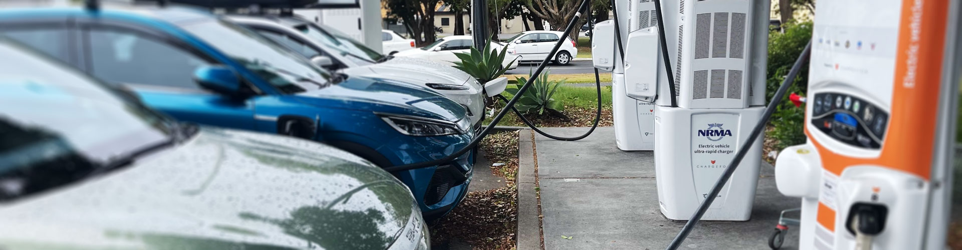 Row of electric cars charging