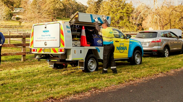 NRMA technician assisting a driver on a country road