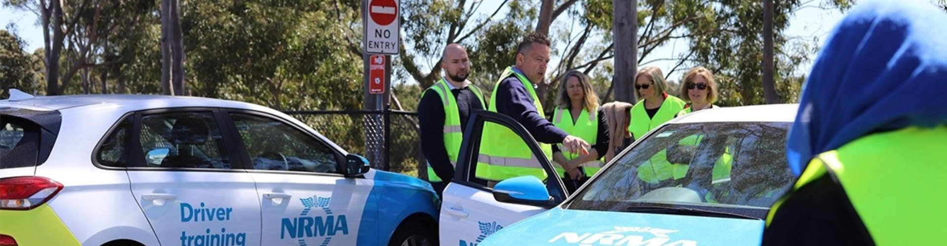 An NRAM instructor takes a group through training