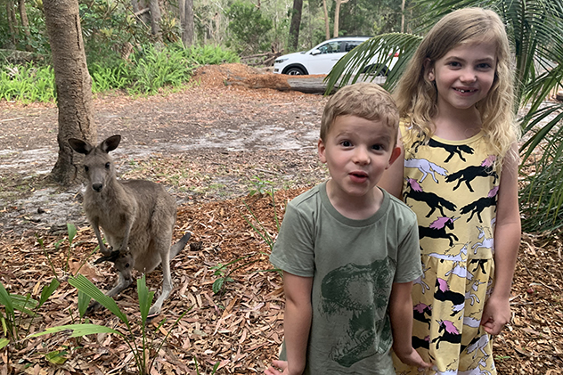Children and a kangaroo at NRMA South West Rocks Holiday Resort