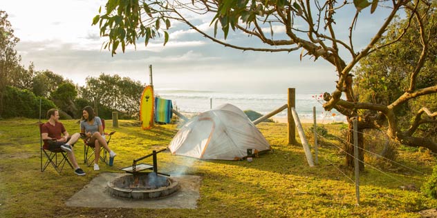 Couple relaxing at Gillards Campground inside Mimosa Rocks National Park