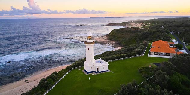 Sun setting over Norah Head Lighthouse, Norah Head, Norah Head