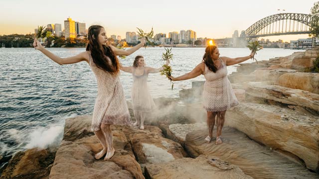 Aboriginal dancers from the Jannawi Dance Clan sharing an immersive cultural experience during an Aboriginal Cultural Tour in Barangaroo, Sydney