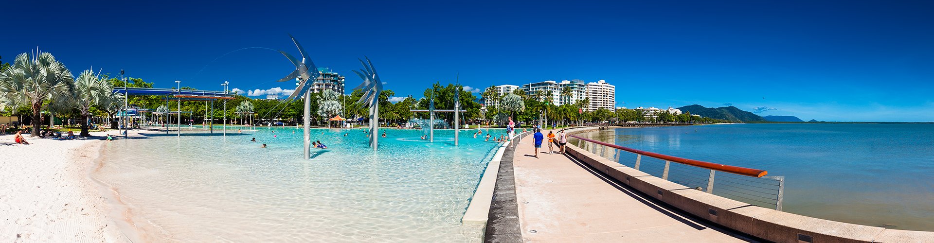 The Esplanade in Cairns with swimming lagoon and the ocean, Queensland, Australia