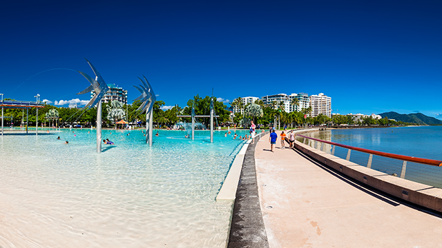 The Esplanade in Cairns with swimming lagoon and the ocean, Queensland, Australia
