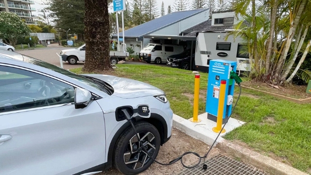 electric vehicle plugged into a public charging station