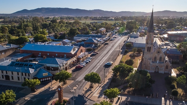 arial view of Mudgee with church and a mix of historic and modern shop fronts