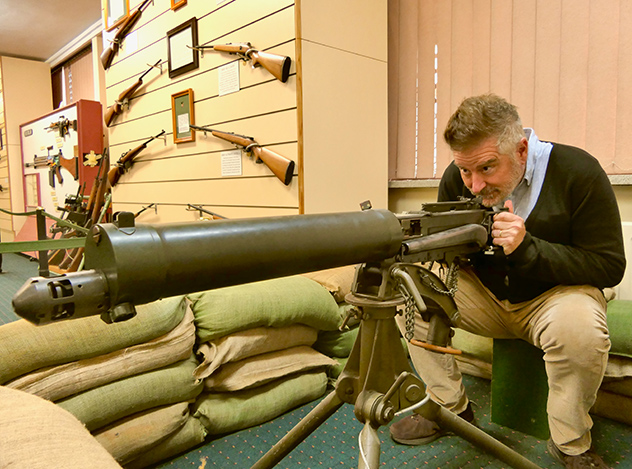 Man at Lithgow Small Arms Museum