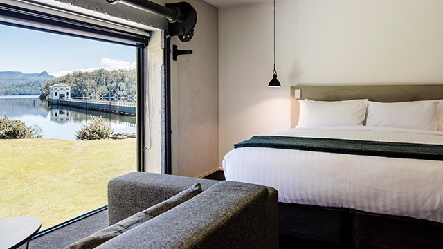 Luxury bedroom overlooking Lake St Clair at Pumphouse Point