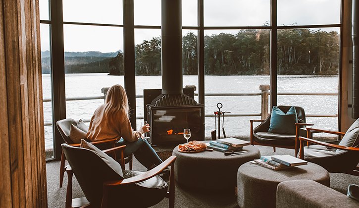 Relax by the fire overlooking Lake St Clair at Pumphouse Point