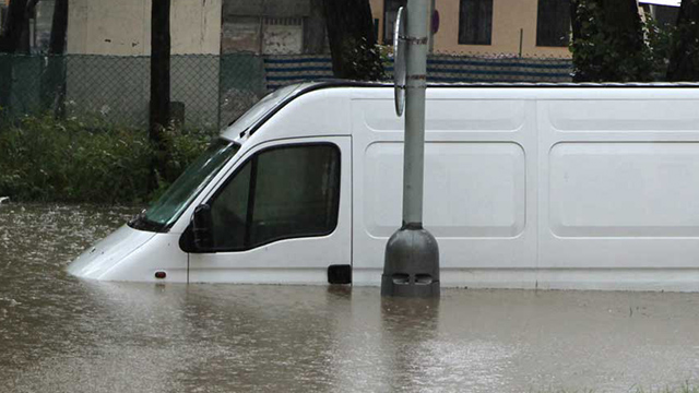 flood hit vehicle van in water