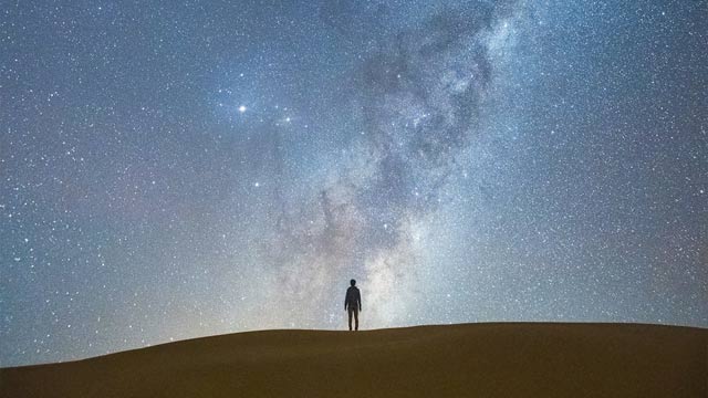 Stars and the Milky Way shining over the Stockton Sand Dunes in Port Stephens. Copyright: Destination NSW