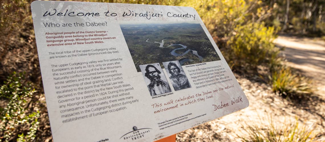 Welcome to Wiradjuri Country sign a Dunns Swamp - Ganguddy in Wollemi National Park. Destination NSW Copyright.