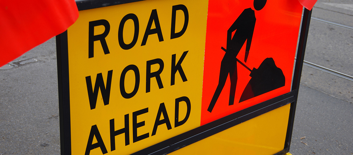 road worker warning sign