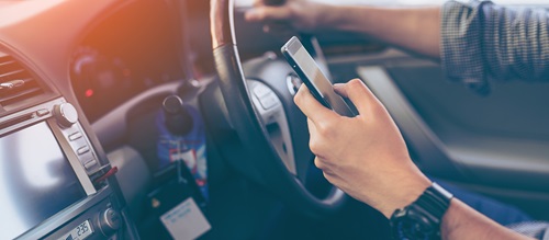 Using a mobile phone and driving