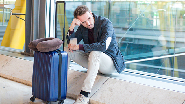 Man waiting with luggage