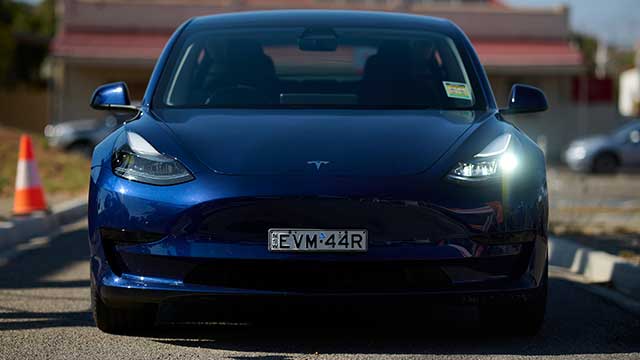 blue tesla electric car 